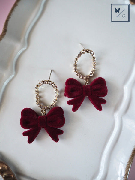 Love Is In The Air - Dangling Bow Earrings